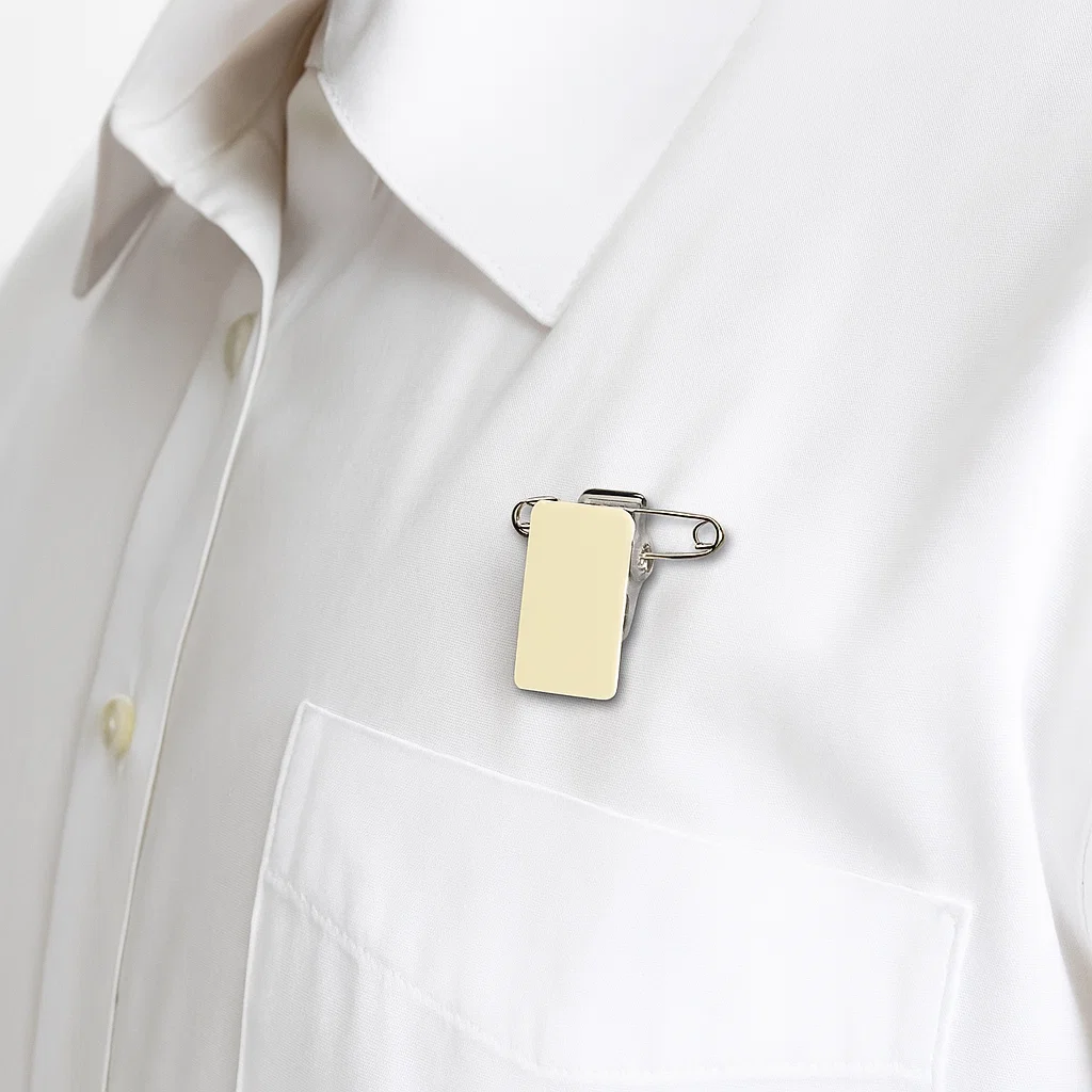 Pinza adhesiva con imperdible